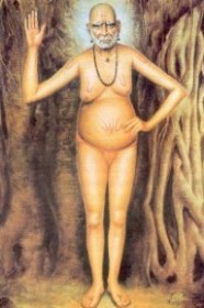 swami samarth standing under banyan tree, akkalkot